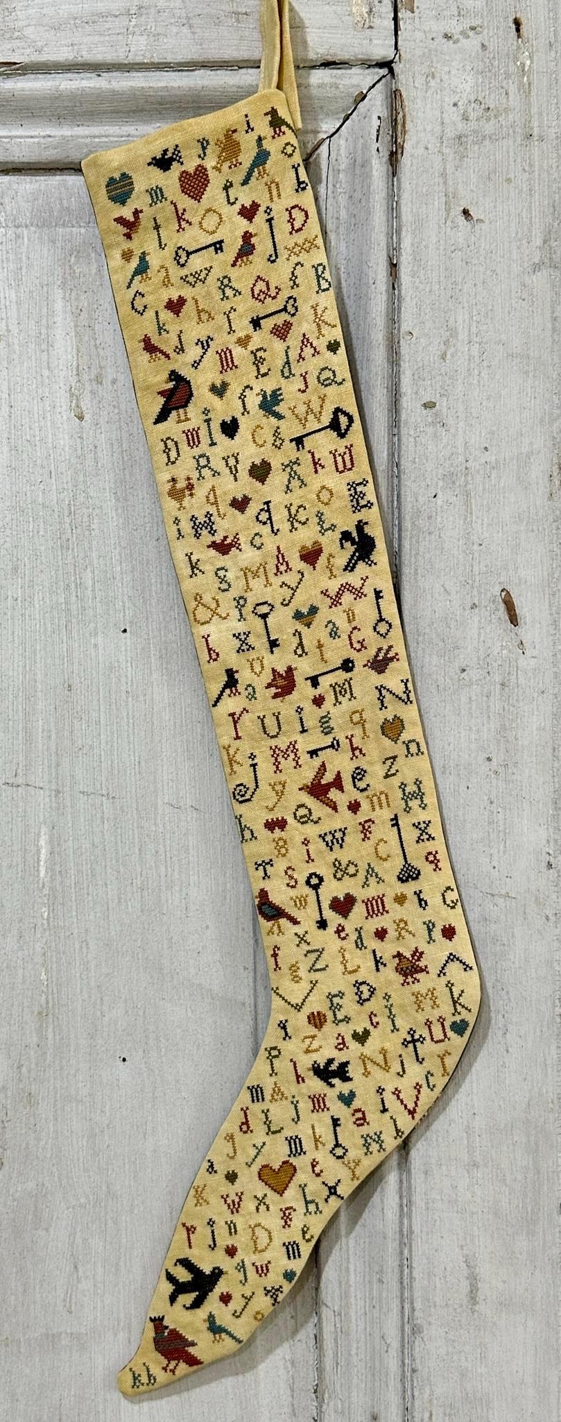A Primitive Stocking by Kathy Barrick Needlework Designs (PRE-ORDER) - Cross Stitch Paper Pattern